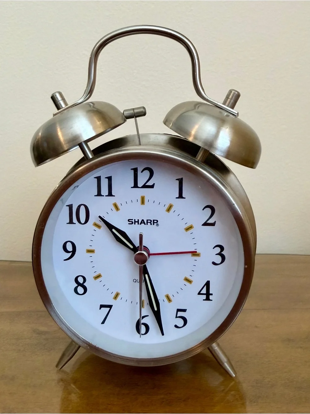 Sharp Twin Bell Alarm Clock in a silver brushed metal finish